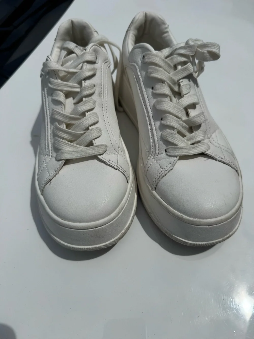ZARA Monochrome lace-up sneakers. Smooth upper. Chunky sole.